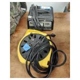 Charger and cord reel