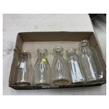 5 Milk bottles