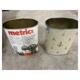 2 small garbage cans