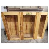 Wall cabinet 47x35in plexiglass pane broken