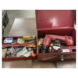 Drill and box with contents