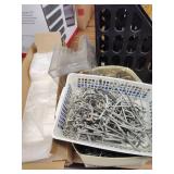 Bags, pegboard hangers, trays