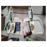 2 dust pans, door lube and remover