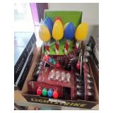 Christmas light bulbs and pens