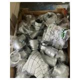 Galvanized pipe fittings, varying sizes