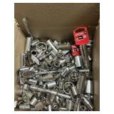 Box of assorted wrenches and sockets