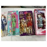 4 Assorted Dolls