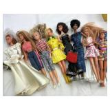 8 Assorted Dolls