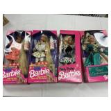4 Assorted Barbie Dolls