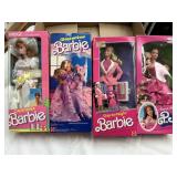 4 Assorted Barbie Dolls