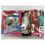 4 Assorted Barbie Dolls