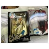 Two Elvis Presley Dolls