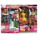 4 Assorted Barbie Dolls