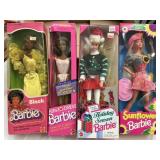 4 Assorted Barbie Dolls