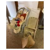 3 kids bicycle carrier seats and 2 dolls