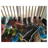 Shelf full of shoes, different sizes