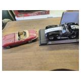 2 die cast cars