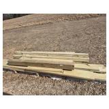 Treated lumber, varying sizes and lengths