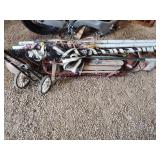 Vintage skis, sleds, assorted sports items