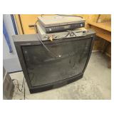 Tv, Vcr and DVD player. TV turns on