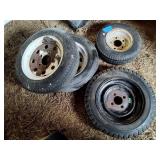 4 trailer wheels and tires