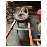 Wheel barrow frame and wheel