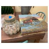 Assorted pictures and jar with noodles