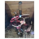 2 trikes, 2 scooters, bike and Pogo stick