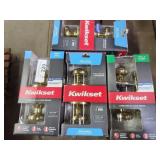 4 Kwikset doorknobs brass