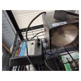 Electric fencer and light