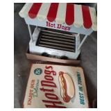 Hot dog cooker and sign