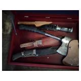 Knives and hatchet in box