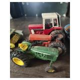 3 die cast tractors