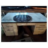 Metal desk missing legs and grates