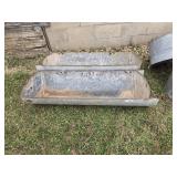 2 metal feeding troughs
