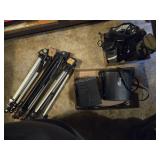 Cameras, binoculars and tripods