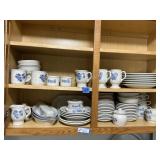 Group of Pfaltzgraff Dishes In Upper Cabinet
