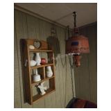 Lamp and items on wall