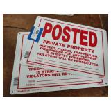 2 trespassing signs