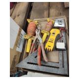 Square, stud finder and tools