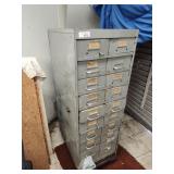 Metal cabinet with contents