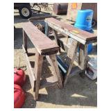 2 sawhorses and trash can