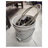 Pail of straps and cable