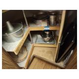 Pans in corner cabinet