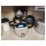Lot of pots, pans and cookers