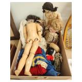 Box of old dolls