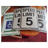 Handicap sign and 3 plastic speed limit signs