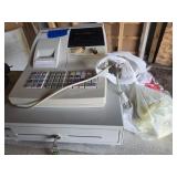 Cash register and paper