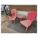2 metal chairs and table