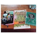 Fishing reels, 2 books and other